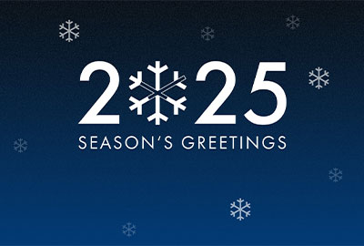 Key visual for the holiday season 2024/2025 with Season's Greetings and some snowflakes.