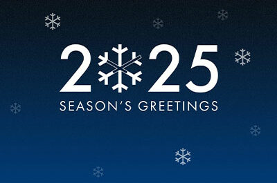 Key visual for the holiday season 2024/2025 with Season's Greetings and some snowflakes.